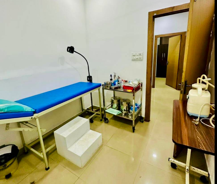 Treatment room with examination table and equipment